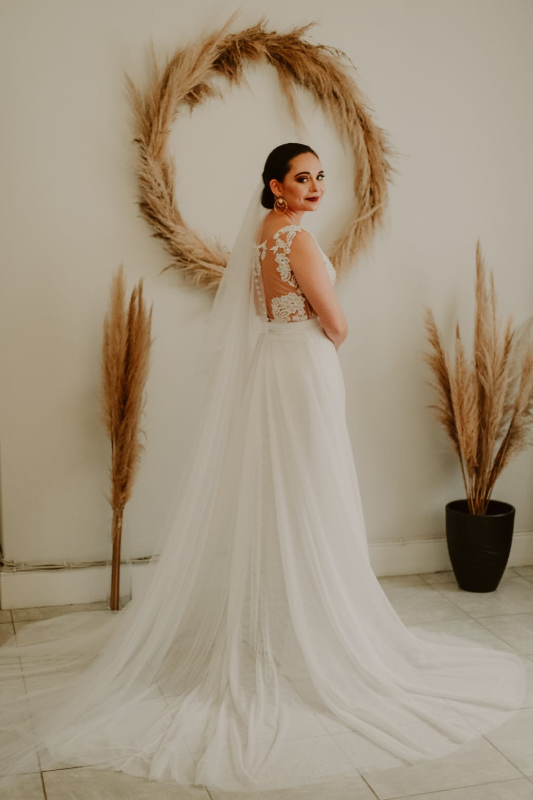 Wanika A Beaded Lace & Tulle Bridal Gown A dreamy blend of romance and elegance, the Wanika gown is designed for the modern bride who loves delicate details and effortless beauty. ✨ Design Highlights: ✔ V-neckline bodice – Flattering and feminine with intricate beaded lace. ✔ Sheer lace back with button closure – A delicate, romantic feature that adds charm. ✔ Soft, flowy A-line skirt – Lightweight and ethereal for graceful movement. ✔ Beaded lace detailing – Adds a touch of shimmer and sophistication. 💫 Customization Options: ✅ Made to measure for the perfect fit. ✅ Available in your preferred colour. ✅ Choose a long or short train to match your vision. ✅ Option for short or long sleeves for added versatility. ✅ Personalize it with or without a slit for a modern or classic touch. 👑 A timeless gown for the bride who loves effortless elegance. 👑 📞 Custom orders available! 📧 info@bestersbridal.co.za | 📱 084 268 1354