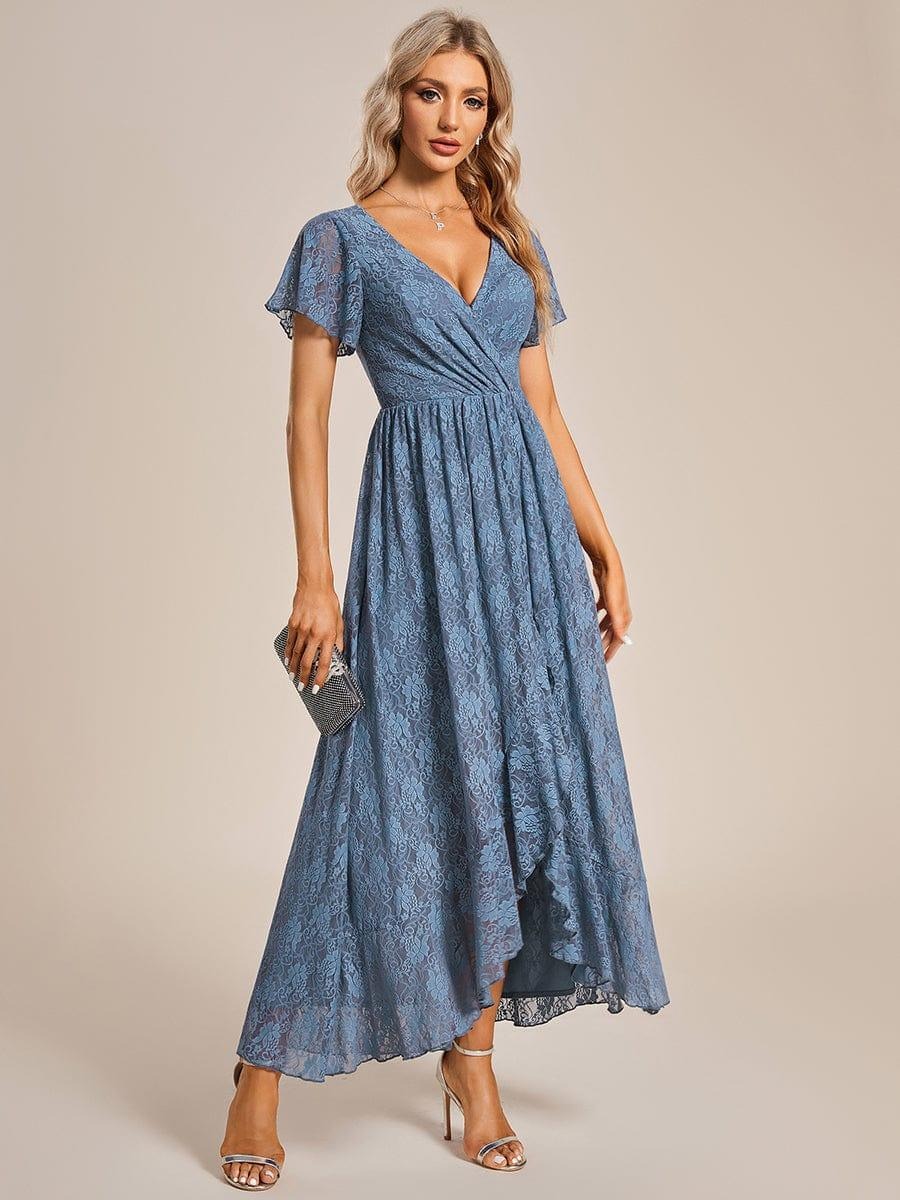 Elise A beautifully detailed Mother of the Bride dress featuring soft short sleeves, romantic ruffled lace, and a flattering silhouette for effortless elegance. This dress is not currently in stock but is available to order.