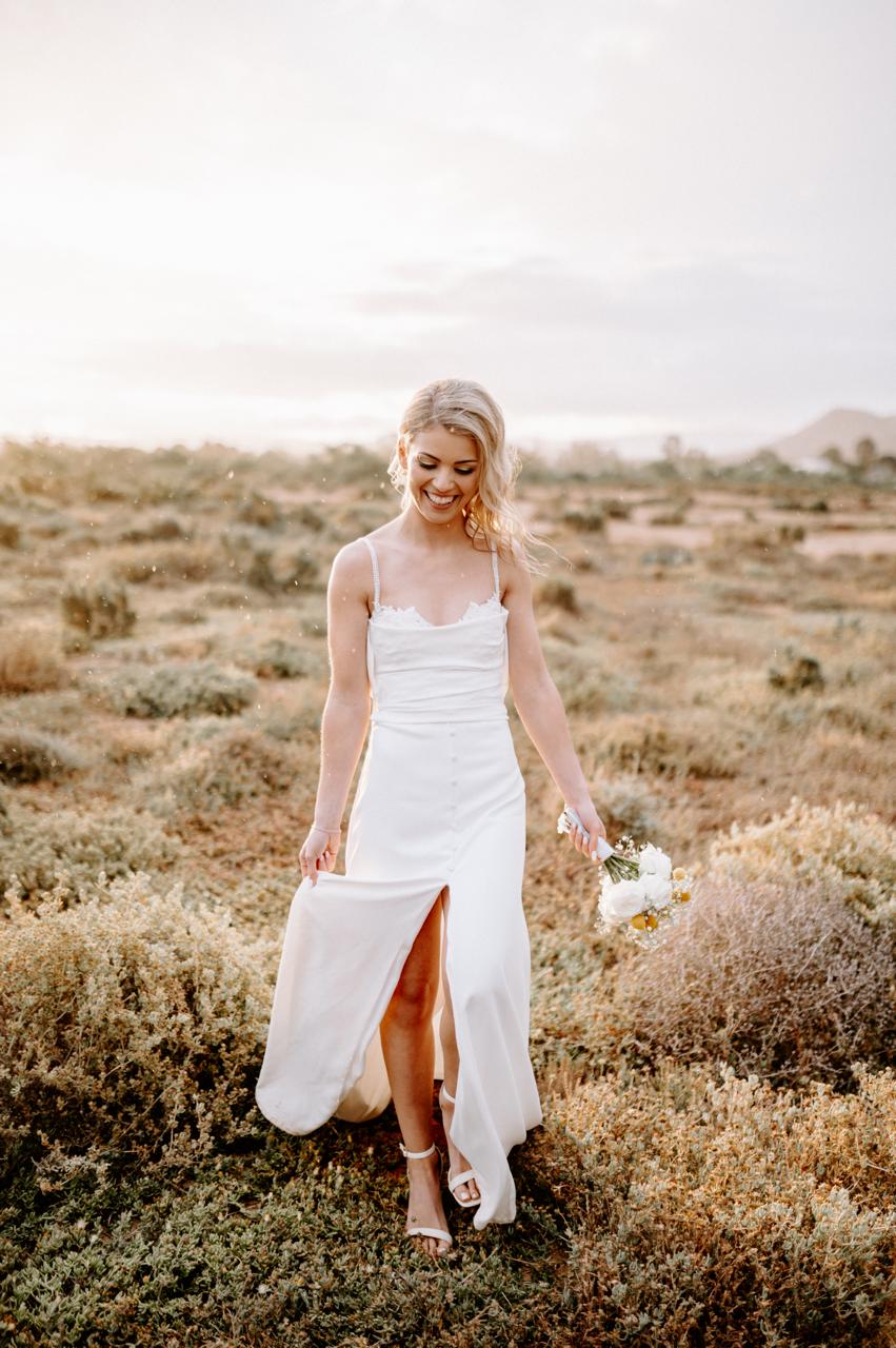 JANE A Crepe & Lace Wedding Gown A stunning blend of modern sophistication and timeless elegance, Jane is designed for the bride who appreciates effortless beauty and refined details. ✨ Design Highlights: ✔ Cowl bodice front and back – Soft draping for an elegant, romantic touch. ✔ Thin straps – Delicate and feminine, ensuring a sleek and minimalistic look. ✔ A-line sheath skirt – A graceful silhouette that flatters effortlessly. ✔ Front slit with fabric-covered buttons – A contemporary yet classic detail that adds movement and charm. ✔ Short train – Just the right length for a sophisticated bridal statement. 💫 Customization Options: ✅ Made to measure for the perfect fit. ✅ Available in your preferred colour. ✅ Choose a long or short train to match your vision. ✅ Option for short or long sleeves for added versatility. ✅ Personalize it with or without a slit for a modern or classic touch. 👑 A timeless gown for the bride who values understated elegance. 👑 📞 Custom orders available! 📧 info@bestersbridal.co.za | 📱 084 268 1354