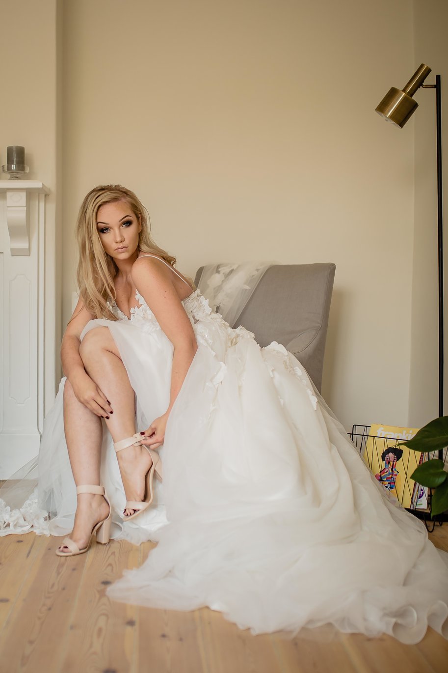 liezel 3D Floral Lace & Tulle Ball Gown with Romantic Princess Silhouette The Liezel gown is a dreamy floral-inspired ball gown, perfect for the bride who wants to feel like a modern-day princess. Crafted from layers of soft tulle and adorned with 3D floral lace appliqués, this gown offers texture, dimension, and graceful movement with every step. ✨ Design Highlights: ✔ Sheer Lace Bodice – Adorned with delicate 3D floral appliqués, creating a whimsical and romantic look. ✔ Thin Straps – Light and elegant, keeping the focus on the intricate bodice. ✔ Princess-Cut A-Line Skirt – Full-flare tulle design for a soft, floating effect. ✔ 3D Floral Lace Details – Scattered throughout the skirt for a cohesive, garden-inspired feel. ✔ Low Zipper Back – Clean and modern with a secure, flattering fit. ✔ Long Flowing Train – Adds ethereal drama to your bridal entrance. 💫 Customization Options: ✅ Custom sizing available for a tailored fit ✅ Option to adjust neckline, strap width, or back style ✅ Add a beaded belt or sleeves for a personalized finish ✅ Available in blush, ivory, or soft white tones 👑 The Liezel gown is for the bride who dreams of a fairytale look filled with texture, elegance, and floral beauty. 👑 📞 Book your custom consultation today! 📧 info@bestersbridal.co.za | 📱 084 268 1354 3D Floral Lace • Sheer Bodice • Tulle Princess Skirt • Long Train • Zipper Back